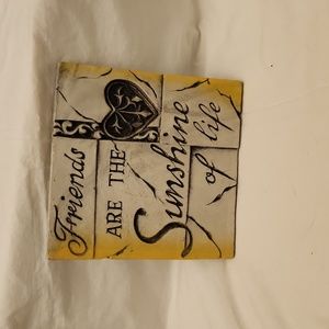 Stone plaque 6 1/2 × 6 1/2 square.